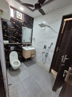 Bathroom in 3 BHK Builder Floor at Mansarover Garden – for Rent