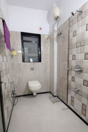 Bathroom in 2 BHK Apartment at Aditya CHS Mulund, Mulund East – for Rent