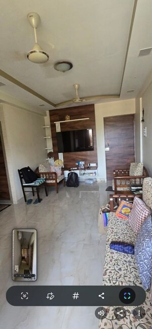 Living Room in 2 BHK Apartment at Gokul Nagari 1, Kandivali East – for Sale