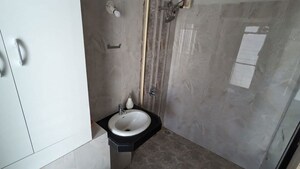 Bathroom in 3 BHK Apartment at Bajaj Enchante Panchsheel CHS, Andheri West – for Rent