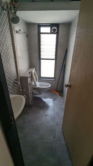 Bathroom in 3 BHK Apartment at Bajaj Enchante Panchsheel CHS, Andheri West – for Rent