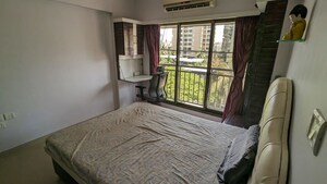 Bedroom in 3 BHK Apartment at Bajaj Enchante Panchsheel CHS, Andheri West – for Rent