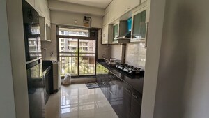 Kitchen in 3 BHK Apartment at Bajaj Enchante Panchsheel CHS, Andheri West – for Rent