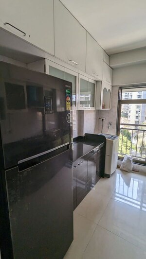 Kitchen in 3 BHK Apartment at Bajaj Enchante Panchsheel CHS, Andheri West – for Rent