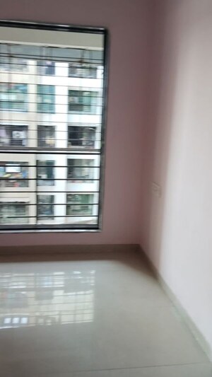 Living Room in 2 BHK Apartment at Sky Avenue, Nalasopara West – for Rent