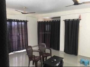 Living Room in 2 BHK Apartment at Accent Ashelar, Chikkanagamangala – for Sale