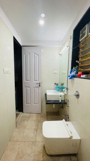 Bathroom in 1 BHK Apartment at Conwood Astoria, Goregaon East – for Rent