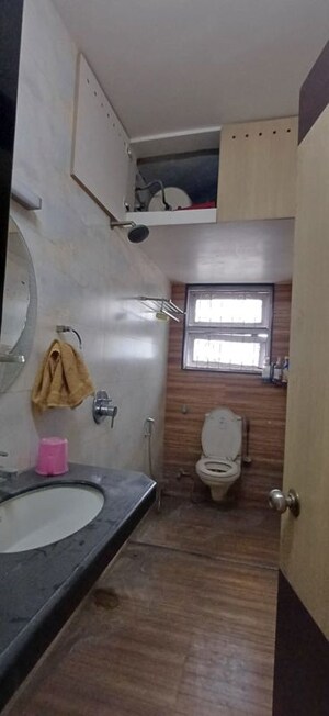 Bathroom in 1 BHK Apartment at Arun Anika Arcade, Pisoli – for Rent