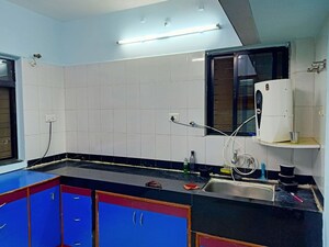 Kitchen in 1 BHK Apartment at Stargaze CHS, Dhanori – for Rent
