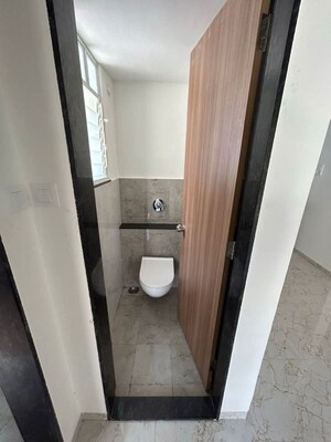 Bathroom in 1 BHK Apartment at Tirupati Regalia Phase 2, Vishrantwadi – for Rent