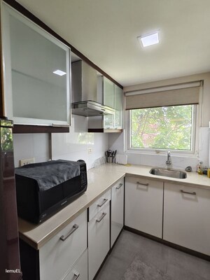 Kitchen in Studio Apartment at Panampilly Nagar – for Sale