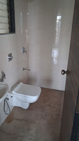 Bathroom in 2 BHK Apartment at Chandak Stella, Goregaon West – for Rent