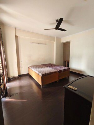 Living Room in 2 BHK Apartment at Amrapali Empire, Sain Vihar – for Sale