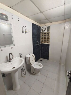 Bathroom in 2 BHK Apartment at Amrapali Empire, Sain Vihar – for Sale