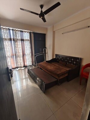Bedroom in 2 BHK Apartment at Amrapali Empire, Sain Vihar – for Sale