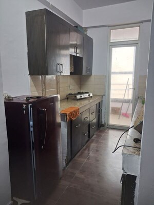 Kitchen in 2 BHK Apartment at Crossing Republik, Crossing Republic – for Sale