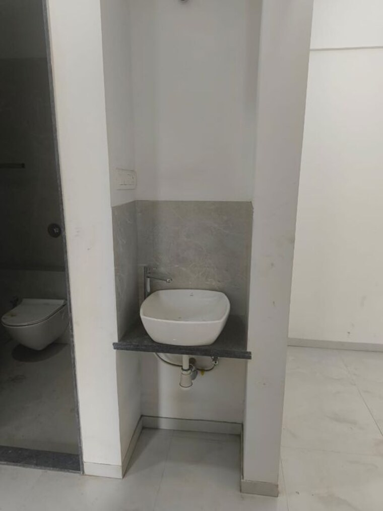 Bathroom, vasant-infinia 2 Bedroom 750 Sq.Ft. Apartment In Wakad Pune 10383055