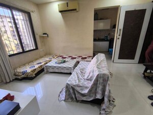 Bedroom in 1 BHK Apartment at Lalani Grandeur, Goregaon East – for Rent