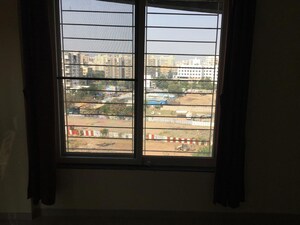 Room in 3 BHK Apartment at Mittal Petals, Wakad – for Sale