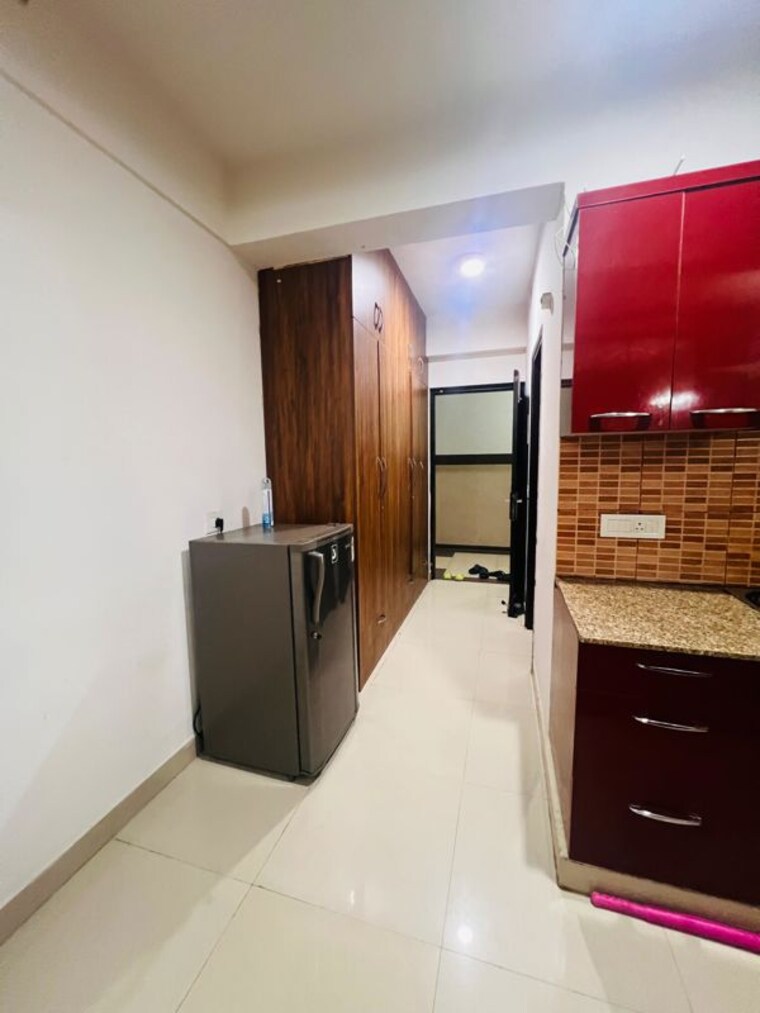 Kitchen, eldeco-edge Studio 600 Sq.Ft. Apartment In Sector 119 Noida 10383082