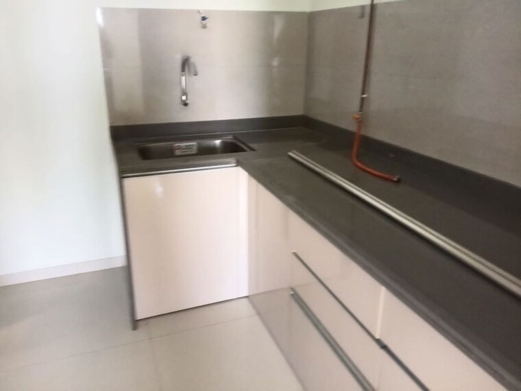 Kitchen, divine-palm-springs 1 Bedroom 448 Sq.Ft. Apartment In Wakad Pune 10383091
