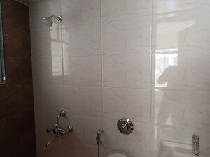 Bathroom in 1 BHK Apartment at Divine Palm Springs, Wakad – for Sale