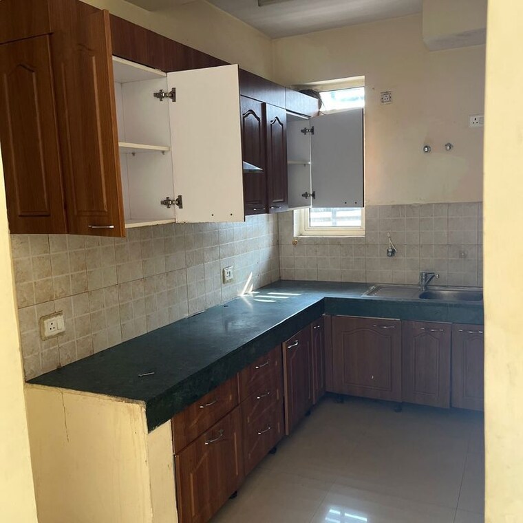 Kitchen, satguru-apartments-faridabad 3.5 Bedroom 1578 Sq.Ft. Apartment In Sector 65 Faridabad 10383103