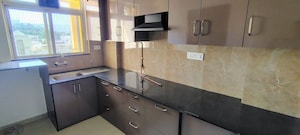 Kitchen in 2 BHK Apartment at Hiranandani Estate Avon, Ghodbunder Road – for Rent