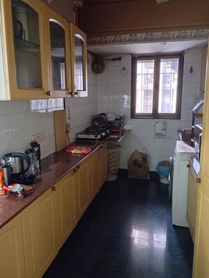Kitchen in 3 BHK Apartment at Silver Arch Eden woods, Andheri West – for Sale