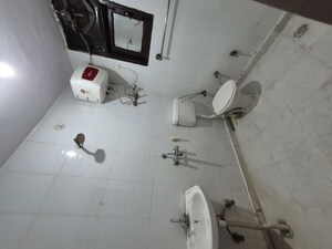 Bathroom in 1.5 BHK Builder Floor at Mayur Vihar – for Rent