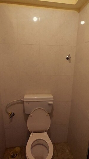 Bathroom in 2 BHK Apartment at Oberoi Mall, Goregaon East – for Rent