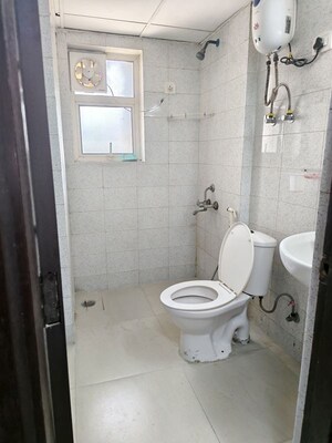 Bathroom in 1 RK Apartment at Logix Blossom Zest, Sector 143 – for Rent