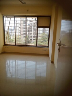 Bedroom in 2 BHK Apartment at Rustomjee Riviera, Malad West – for Rent