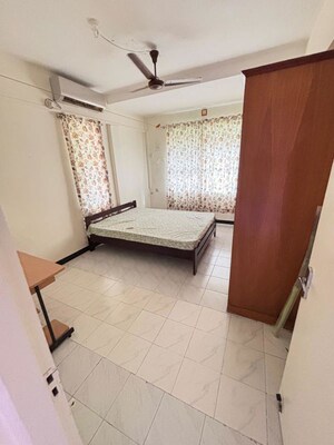 Bedroom in 3 BHK Builder Floor at Rahul Towers, Kothrud – for Rent