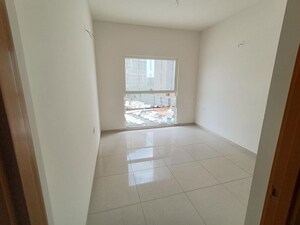 Bathroom in 2 BHK Apartment at Bhartiya Nikoo Homes Phase 2, Thanisandra Main Road – for Rent