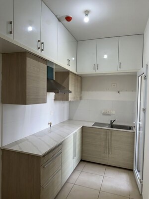 Kitchen in 2 BHK Apartment at Bhartiya Nikoo Homes Phase 2, Thanisandra Main Road – for Rent