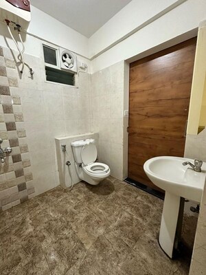 Bathroom in 2 BHK Apartment at Bhartiya Nikoo Homes Phase 2, Thanisandra Main Road – for Rent