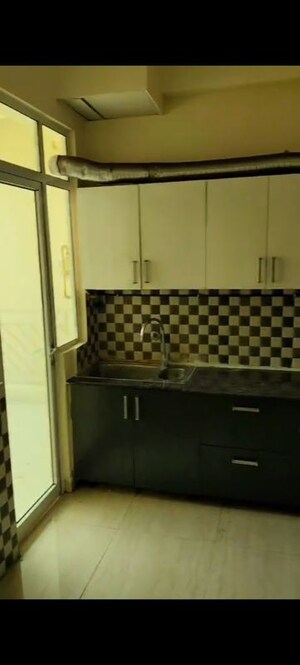 Kitchen in 3 BHK Apartment at Gaur Saundaryam Phase II, Tech Zone 4 Greater Noida – for Rent