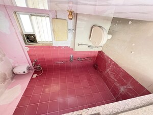 Bathroom in 2 BHK Apartment at Kanakia Spaces Niharika, Manpada – for Rent
