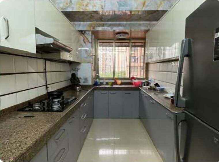 Kitchen, ajmera-beverly-hills-and-royal-empire 3 Bedroom 1500 Sq.Ft. Apartment In Andheri West Mumbai 10020313