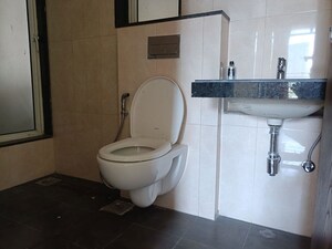 Bathroom in 3 BHK Apartment at Sheth Zuri, Laxmi Nagar – for Rent