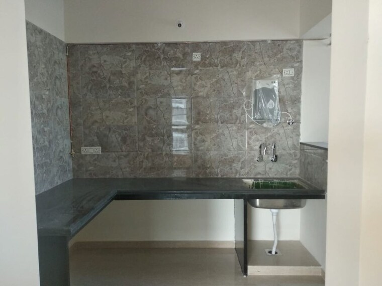 Kitchen, 5-star-royal-grande 2 Bedroom 836 Sq.Ft. Apartment In Wakad Pune 10383550