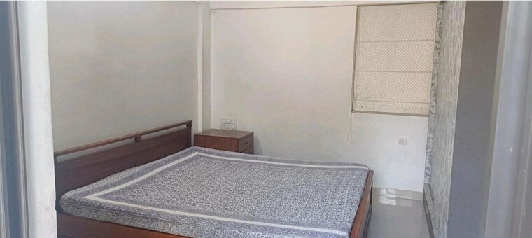Bedroom, amit-astonia 2 Bedroom 1000 Sq.Ft. Apartment In Baner Pune 10383577