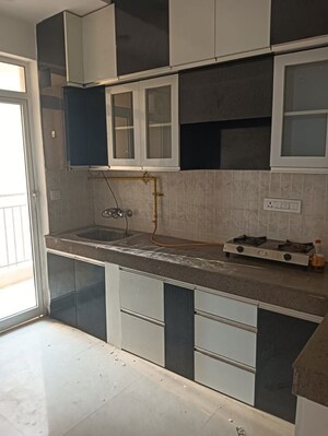 Kitchen in 3 BHK Apartment at ATS Allure, Sector 22d Yamuna Expressway – for Rent
