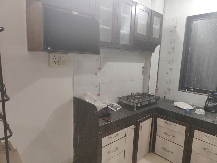 Kitchen, mukta-residency-phase-2 2 Bedroom 650 Sq.Ft. Apartment In Shilphata Thane 10383676