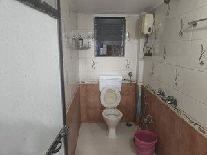 Bathroom in 2 BHK Apartment at Mukta Residency Phase 2, Shilphata – for Rent