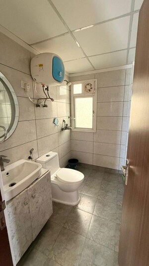 Bathroom in 2.5 BHK Apartment at Gulshan Botnia, Sector 144 – for Rent