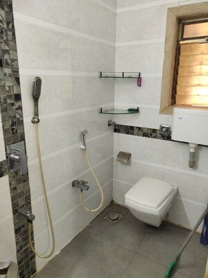 Bathroom in 2 BHK Apartment at Swiss Corner, Andheri West – for Rent