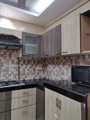 Kitchen in 2 BHK Apartment at Swiss Corner, Andheri West – for Rent