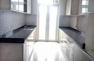 Kitchen in 3 BHK Apartment at Omkar Alta Monte, Malad East – for Rent